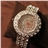 Savina Crystal Rhinestones Decor Round Dial Women's Quartz Wrist Watch with Stainless Steel Watch Chain (Golden)