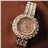 Savina Crystal Rhinestones Decor Round Dial Women's Quartz Wrist Watch with Stainless Steel Watch Chain (Golden)